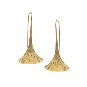 Pair of gold toned gingko shaped earrings on a white background