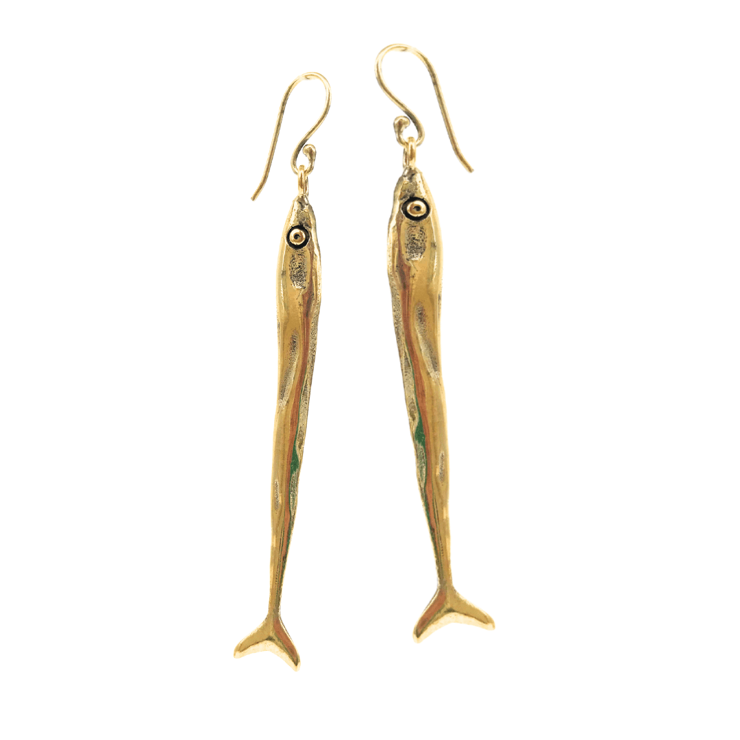Gold toned fish-shaped earrings on a white background
