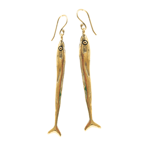 Gold toned fish-shaped earrings on a white background