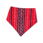 Load image into Gallery viewer, Pink, red and black patterned bandana bib on a white background
