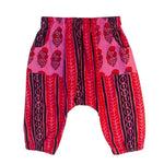 Load image into Gallery viewer, Pin, red and black patterned harem pants on a white background

