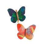 Load image into Gallery viewer, Two colorful butterfly-shaped hair clips on a white background
