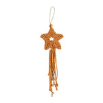 Load image into Gallery viewer, A handmade macrame star ornament in a warm golden-brown color, featuring a five-pointed star body, a hanging loop at the top, and long dangling tassels with small bead accents, shown against a plain white background.
