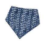 Load image into Gallery viewer, Blue bib with white leaf pattern on a white background
