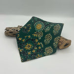 Load image into Gallery viewer, Green patterned bib on a white background with wooden elements.
