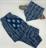 Load image into Gallery viewer, Blue and white patterned pants and matching bib on a white background
