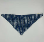 Load image into Gallery viewer, Blue bandana bib with white patterns on a light gray background

