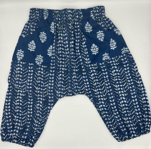 Blue pants with white floral pattern on a white background