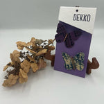 Load image into Gallery viewer, Butterfly-shaped hair clips on a card with 'DEKKO' branding, next to dried flowers.

