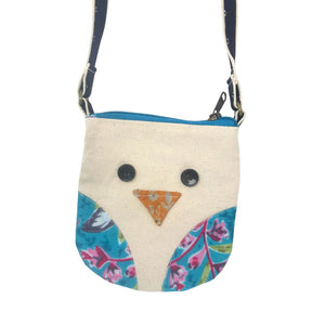 Small bag with owl design on a white background