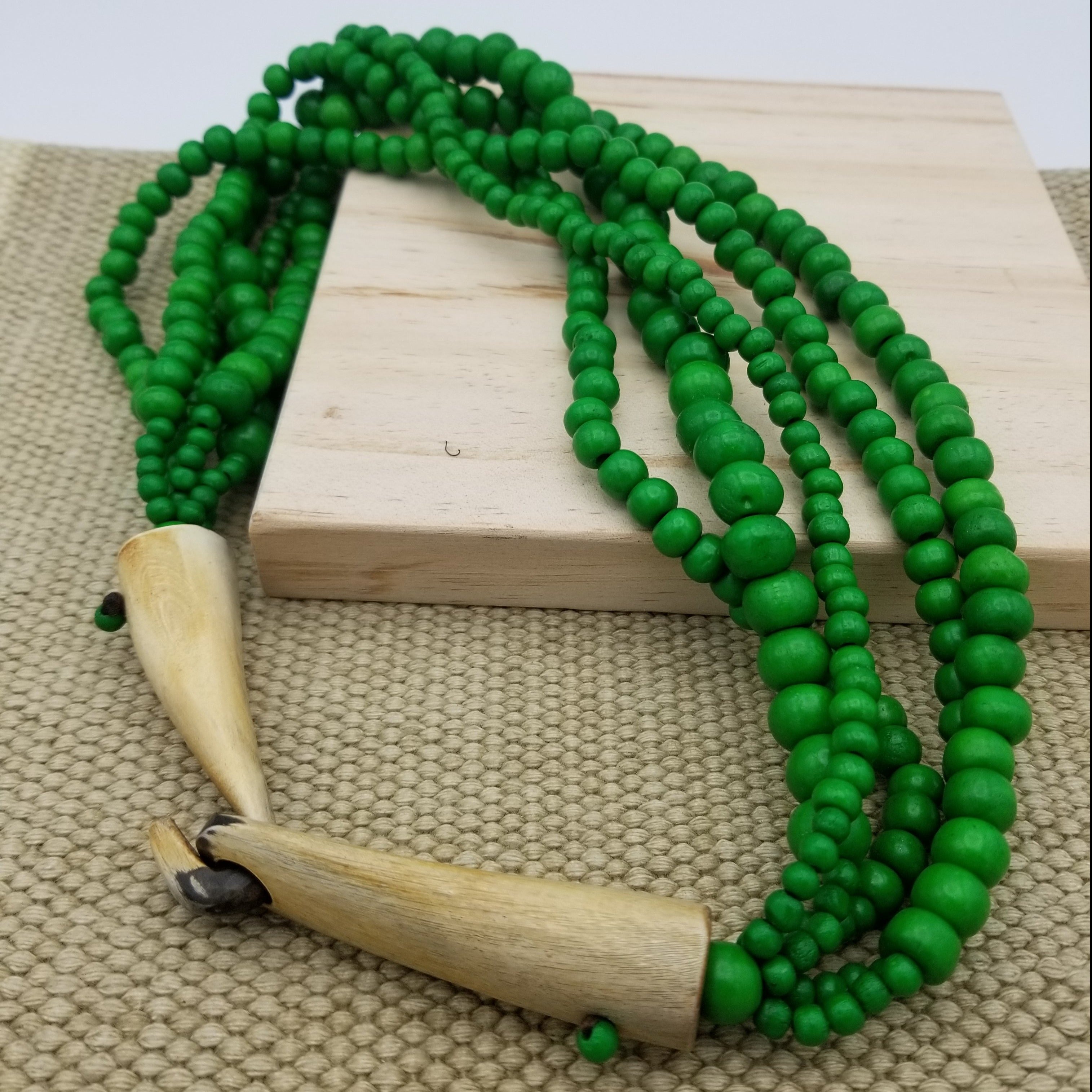 Bone Bead Necklace with Horn Clasp